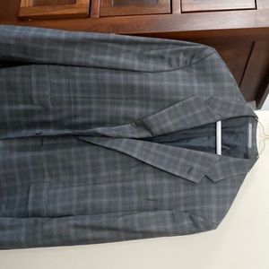 Two button Sports Coat in pattern of brown and a little light blue